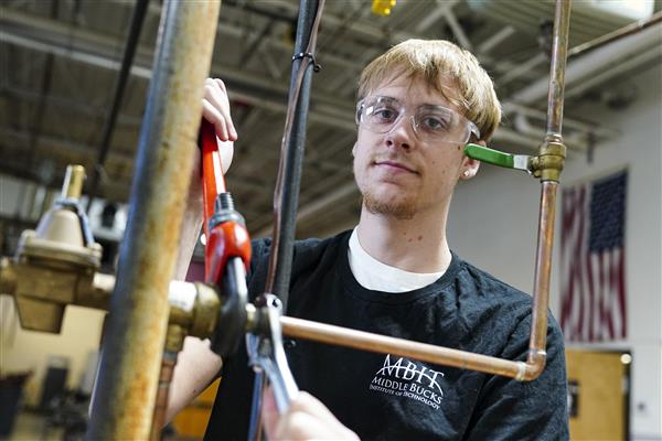PLUMBING & HEATING TECHNOLOGY student working in lab